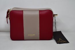 An as new Alinari Firenze Flavia crossbody bag in red/taupe.