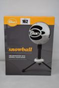 A boxed as new Logitech Blue Snowball USB Microphone (P/N: 988-000175) (Box sealed).