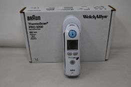 A boxed as new Braun ThermoScan PRO 6000 ear thermometer (#REF: 06000-200).
