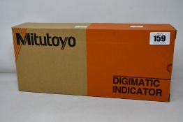 A boxed as new Mitutoyo 543-491B digimatic indicator (PN: ID-C150MXB, EAN: 4946368586779).