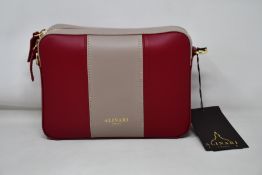 An as new Alinari Firenze Flavia crossbody bag in red/taupe.