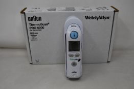 A boxed as new Braun ThermoScan PRO 6000 ear thermometer (#REF: 06000-200).