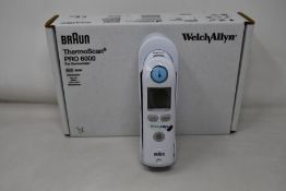 A boxed as new Braun ThermoScan PRO 6000 ear thermometer (#REF: 06000-200).