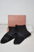 A pair of as new Wolford x Amina Muaddi vegan leather socks (L - RRP £184).