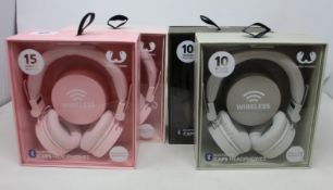 Four boxed fresh and rebel caps Bluetooth headphones.