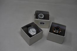 Three men's as new Vault automatic watches.