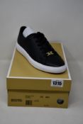 A pair of as new Michael Kors Keaton lace up sneakers (US 8M).
