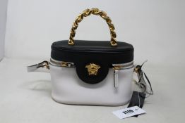 An as new Versace Medusa Vanity white/black crossbody bag (Possibly ex-display, immaculate condition