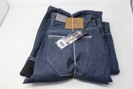 Two pairs of as new Alberto Bike Rain & Windfighter jeans (W34/L32, W36/L32).