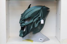 A 3D printed Green Goblin cosplay mask.