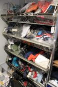 A quantity of assorted as new clothing and related items.