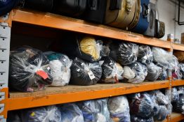 Ten bags of pre-owned clothing and related items.