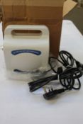 A boxed as new Welch 2511C-02 Dry Vaccum Pump / Compressor.