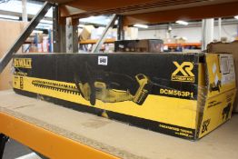 A DeWalt DCM563P1 Cordless Hedge Trimmer.