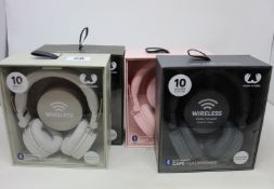 Four boxed fresh and rebel caps Bluetooth headphones.