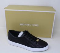 A pair of as new Michael Kors Keaton lace up sneakers (US 9.5M).