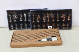 An as new GiftHome Rome metallic chess set with board.