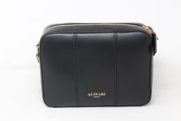 An as new Alinari Firenze Flavia crossbody bag in black.