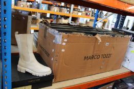 Twelve pairs of as new Marco Tozzi Chelsea boots in cream (Assorted sizes).