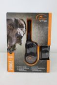 A boxed as new SportDOG SportTrainer 700M remote trainer.