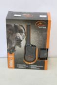 A boxed as new SportDOG SportTrainer 700M remote trainer.