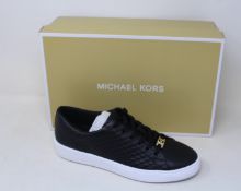 A pair of as new Michael Kors Keaton lace up sneakers (US 7M).
