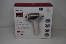 A boxed as new Philips Lumea IPL 9000 hair removal device.