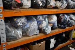 Eleven bags of as new clothing and related items.