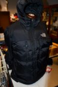 A men's as new The North Face Himalayan light down hoodie jacket (XL).