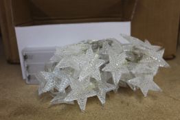 A quantity of Christmas star lights (Approximately 35 items).