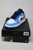 A pair of youths as new Nike Air Jordan 1 Low (UK 4.5).