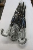 Twelve black walking stick umbrellas with car brand motif.