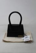 An as new Jacquemus Le Chiquito Moyen bag (RRP £480).
