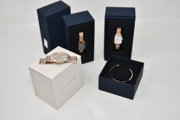 Two ladies' Daniel Wellington Quadro Watches (RG Green and RG White), a Daniel Wellington Classic