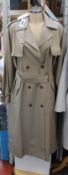 An as new A Line belted tencel-blend trench coat (Tag XXS/XS but fits like a M+ €615).