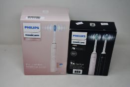 A boxed as new Philips Sonicare 9000 Diamond clean rechargeable toothbrush in pink (Box sealed)