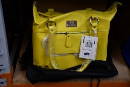 An as new Nova Harley Luxury Divine leather changing bag.