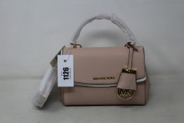 An as new Michael Kors Ava crossbody bag in soft pink.