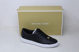 A pair of as new Michael Kors Keaton lace up sneakers (US 6M).