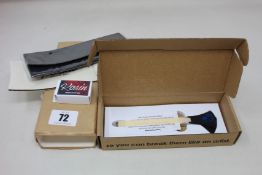 A boxed as new Pickaso guitar bow/pick in Sapphire Blue.