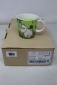 A box of six as new Arabia Moomin mugs with Moomintroll grass-green design.