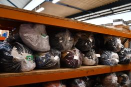 Ten bags of pre-owned clothing and related items.