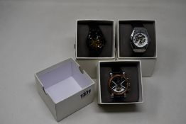 Three men's as new Vault automatic watches.