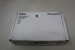 A boxed as new Braun welch allyn ThermoScan PRO 6000 with cradle.