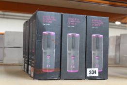 Twelve Cordless Automatic Hair Curlers.
