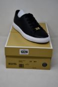 A pair of as new Michael Kors Keaton lace up sneakers (US 8M).