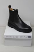 A pair of men's as new Cos leather Chelsea boots (EU 43).