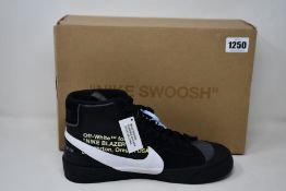 A pair of as new Nike Off White The 10 Nike Blazer Mid (UK 8).
