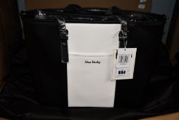 An as new Nova Harley Luxury Miami leather changing bag.