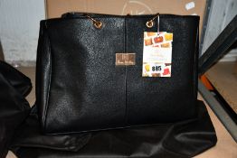 An as new Nova Harley Luxury Melbourne leather changing bag.